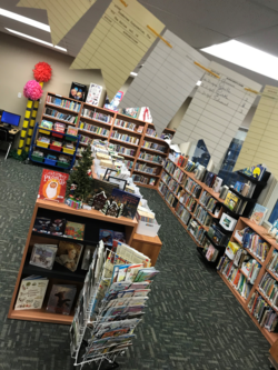 library shelves with paper banner in foreground