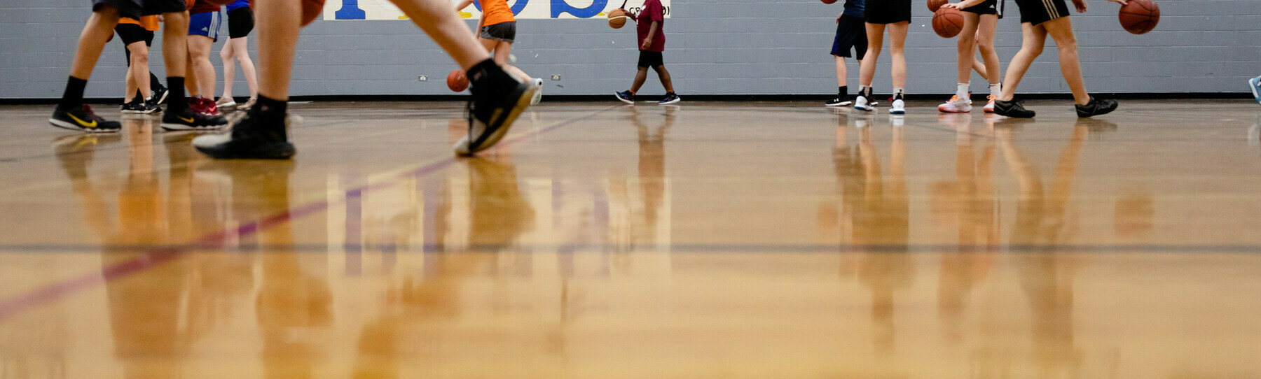 students playing basketball